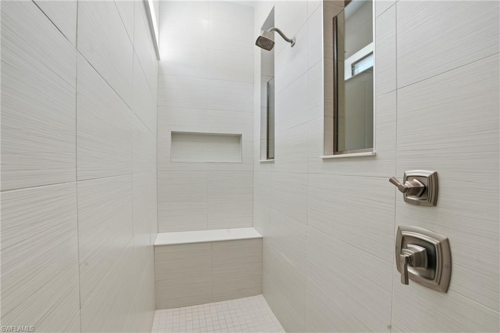 1872 Terreno Boulevard Naples, FL 34120 - Photo 22 of 50 a bathroom with a shower
