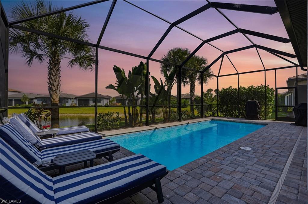1872 Terreno Boulevard Naples, FL 34120 - Photo 31 of 50 a view of a patio with swimming pool