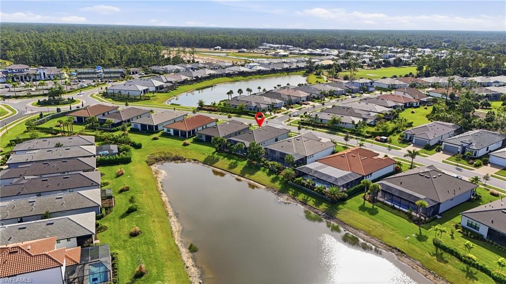 1872 Terreno Boulevard Naples, FL 34120 - Photo 41 of 50 an aerial view of residential houses with outdoor space and river