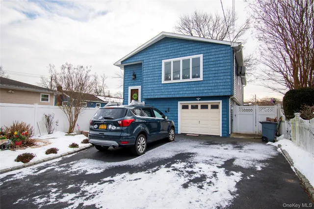 a car parked in front of a house
