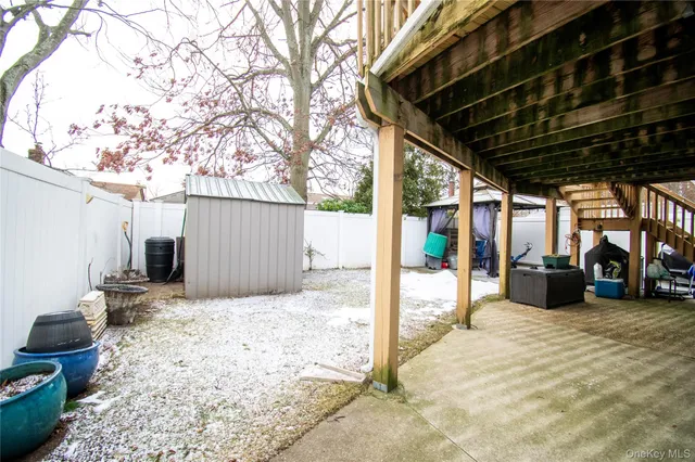 a view of a backyard of the house