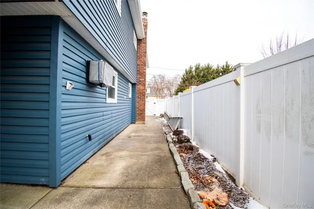 a view of a backyard with sitting area