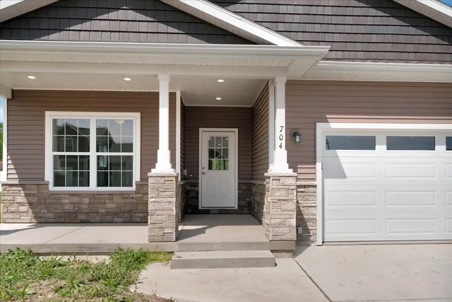 a front view of a house with a entrance