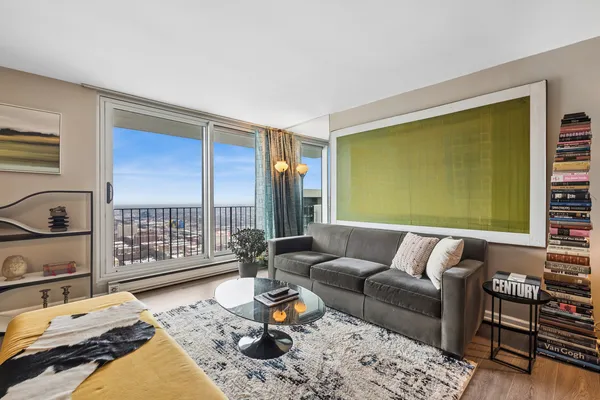 a living room with furniture and a window