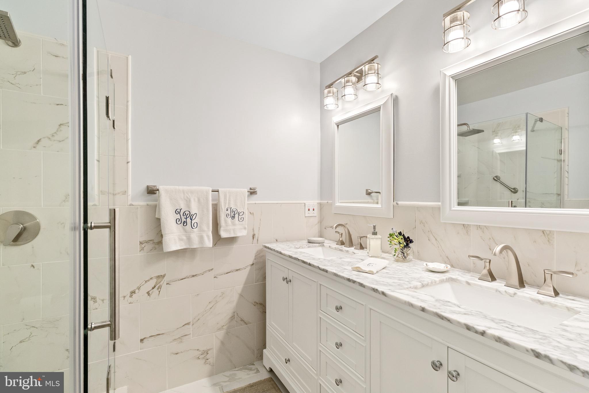 1203 Doves Cove Road Towson, MD 21286 - Photo 28 of 49 Primary bathroom w marble features.