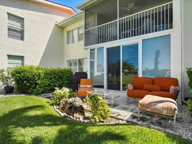 a garden view with a seating space