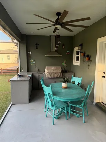 a bathroom with a toilet a sink and a mirror