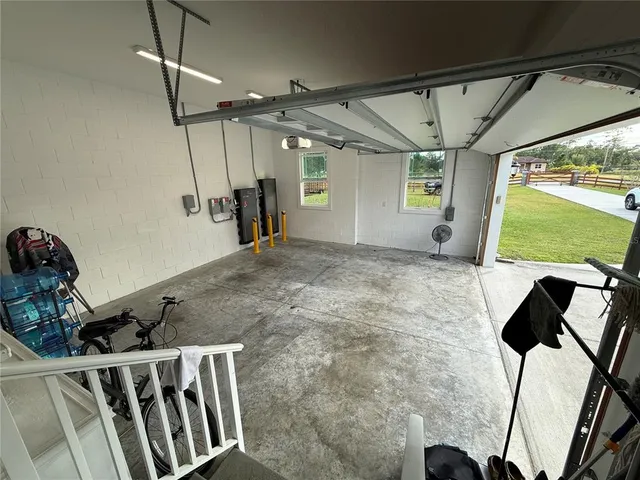 a view of a park with large trees