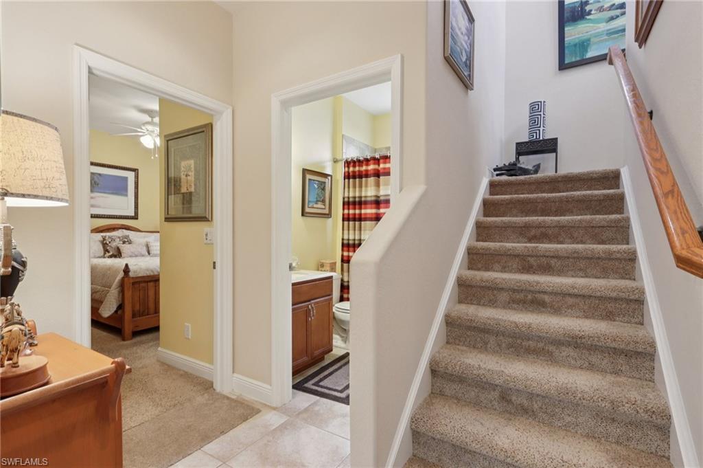 19612 Tesoro Way Estero, FL 33967 - Photo 24 of 50 a view of entryway and hall with wooden floor