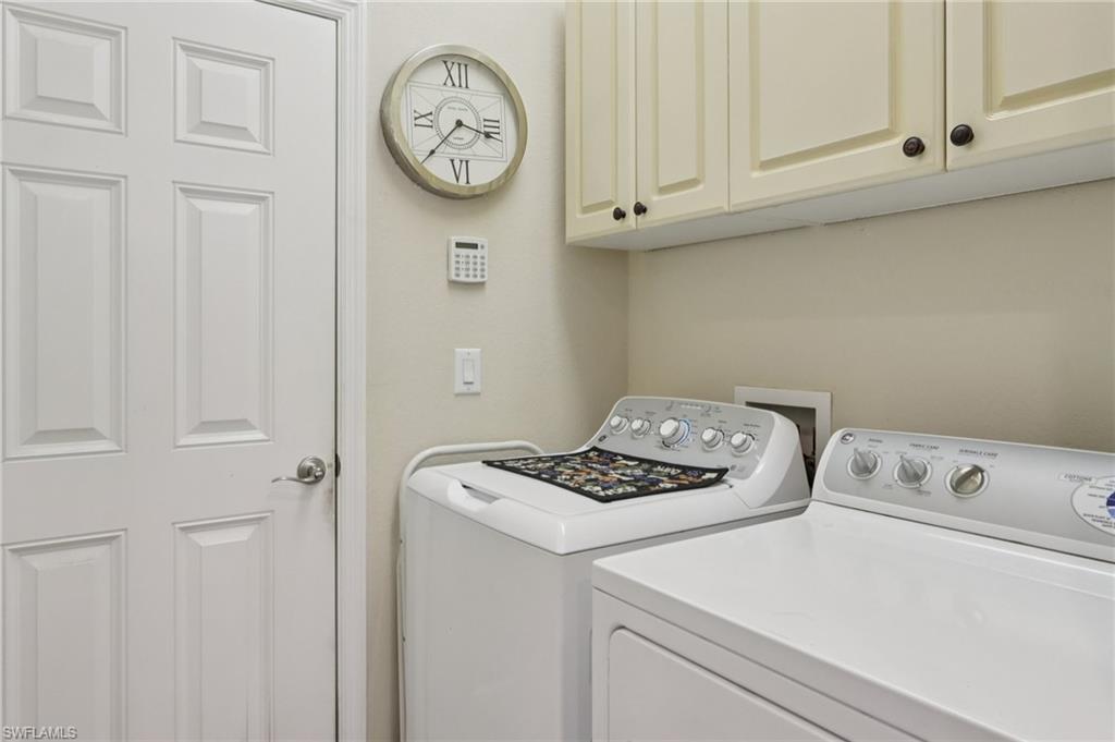 19612 Tesoro Way Estero, FL 33967 - Photo 27 of 50 a utility room with dryer and washer