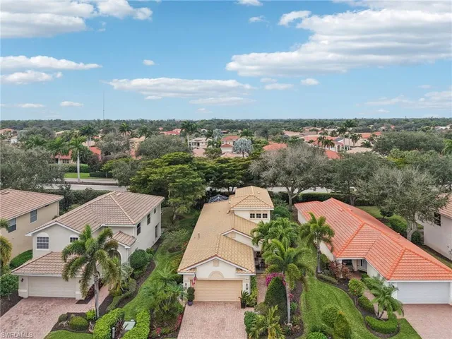 an aerial view of a house with a garden
