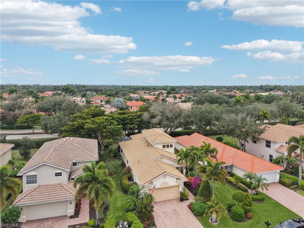 19612 Tesoro Way Estero, FL 33967 - Photo 39 of 50 an aerial view of a house with a garden