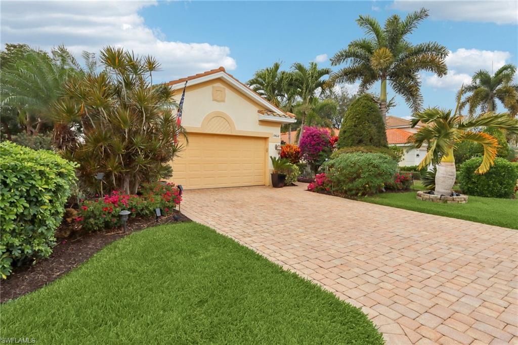 19612 Tesoro Way Estero, FL 33967 - Photo 4 of 50 a front view of house with yard