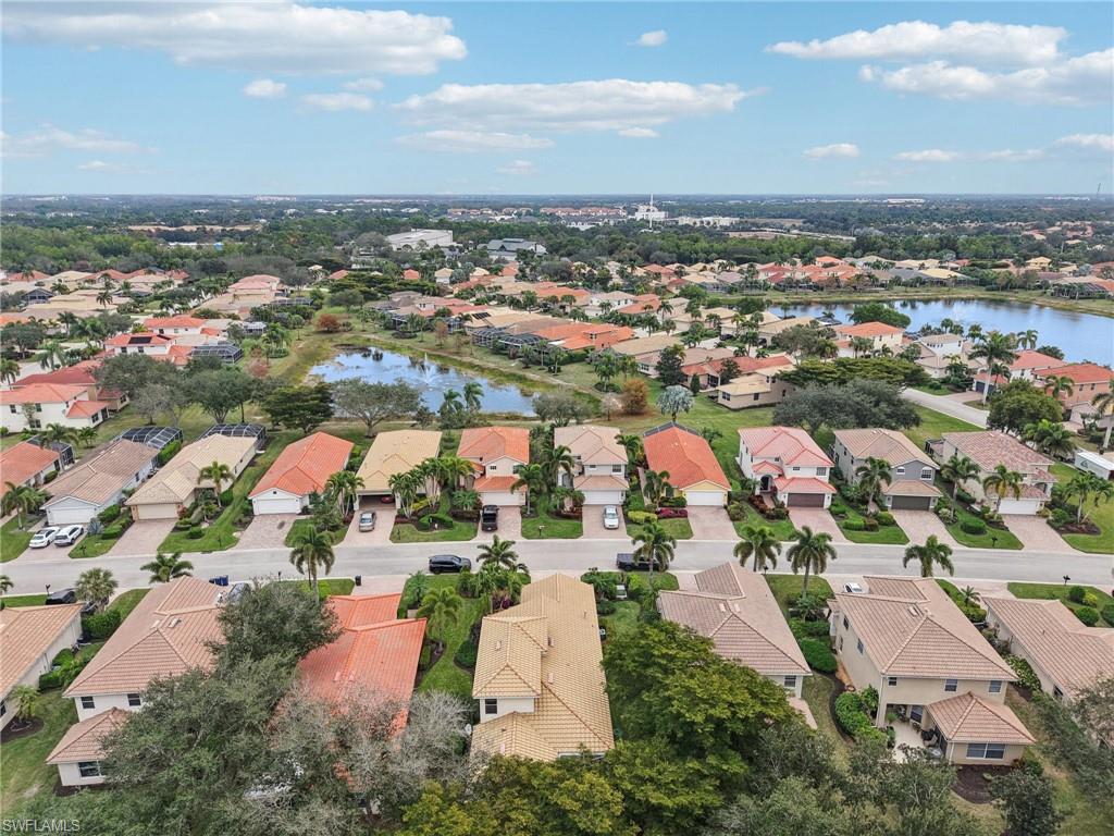 19612 Tesoro Way Estero, FL 33967 - Photo 44 of 50 an aerial view of residential houses with outdoor space