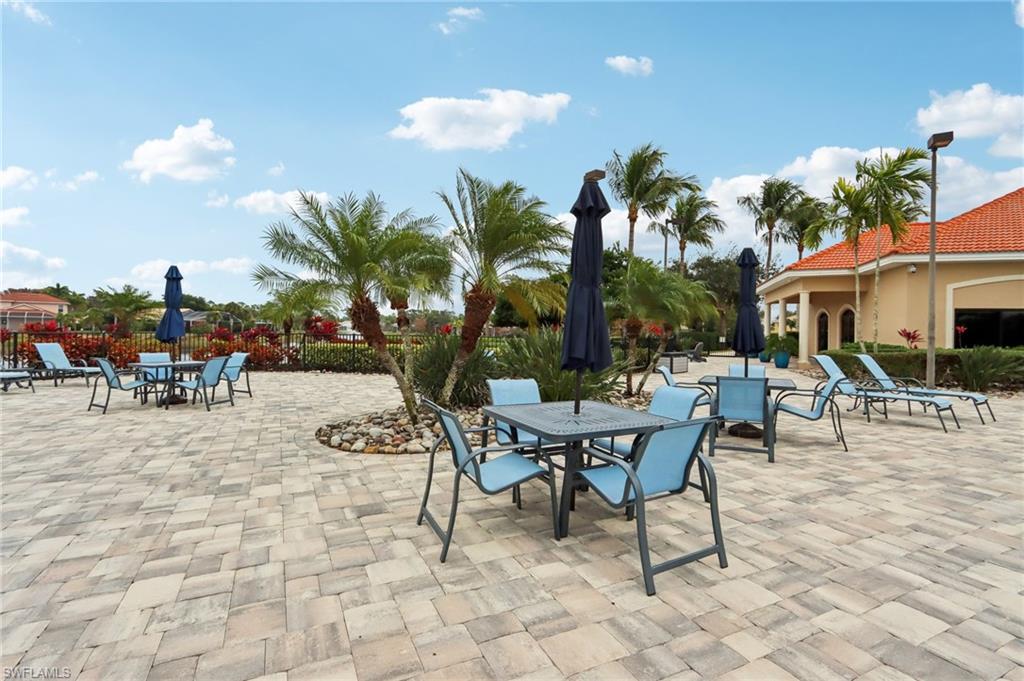 19612 Tesoro Way Estero, FL 33967 - Photo 50 of 50 a outdoor space with furniture