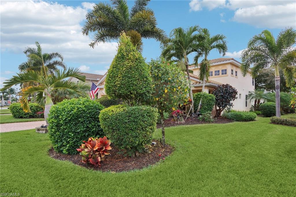 19612 Tesoro Way Estero, FL 33967 - Photo 5 of 50 a view of a sign in front of a house