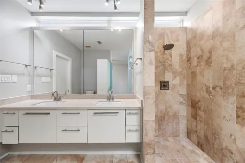 a bathroom with a sink and a bathtub