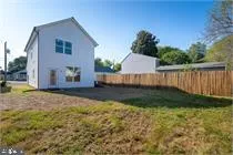 a view of back yard of the house