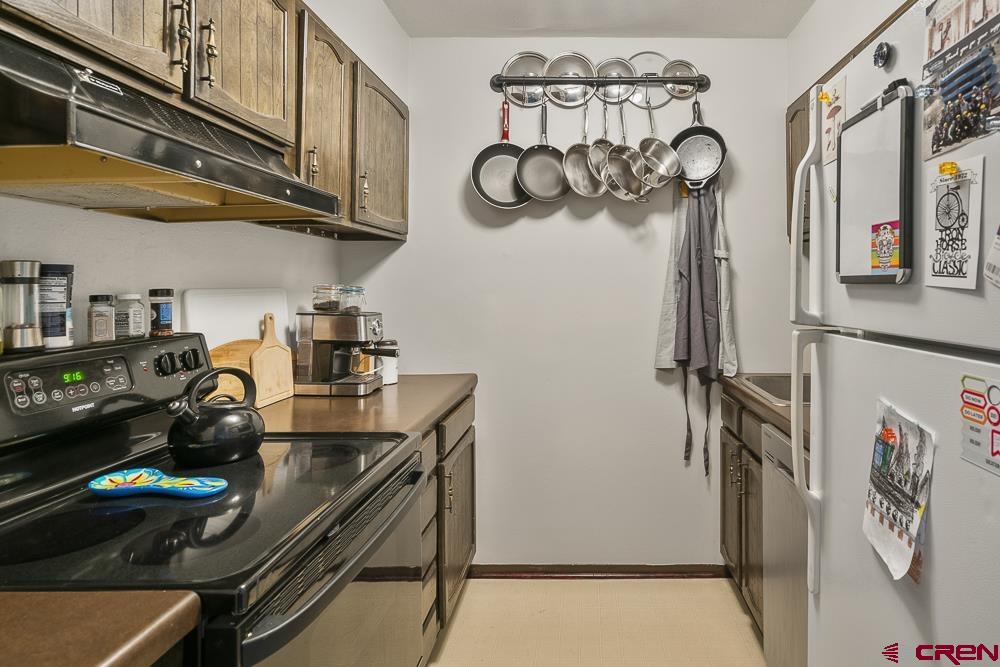 34237 Highway 550, Unit 18 Durango, CO 81301 - Photo 13 of 21 a room with lots of bottles of alcohol