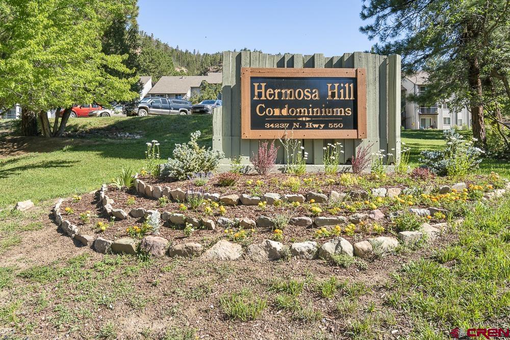 34237 Highway 550, Unit 18 Durango, CO 81301 - Photo 2 of 21 a sign on the side of the road