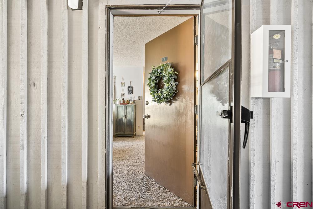 34237 Highway 550, Unit 18 Durango, CO 81301 - Photo 3 of 21 a view of a bathroom from a corridor