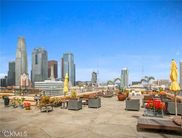 a view of swimming pool with seating space