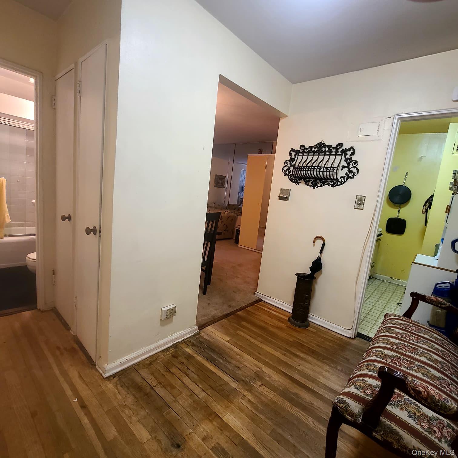 83-25 98th Street, Unit 2T Queens, NY 11421 - Photo 2 of 6 a view of a bedroom with wooden floor and bedroom