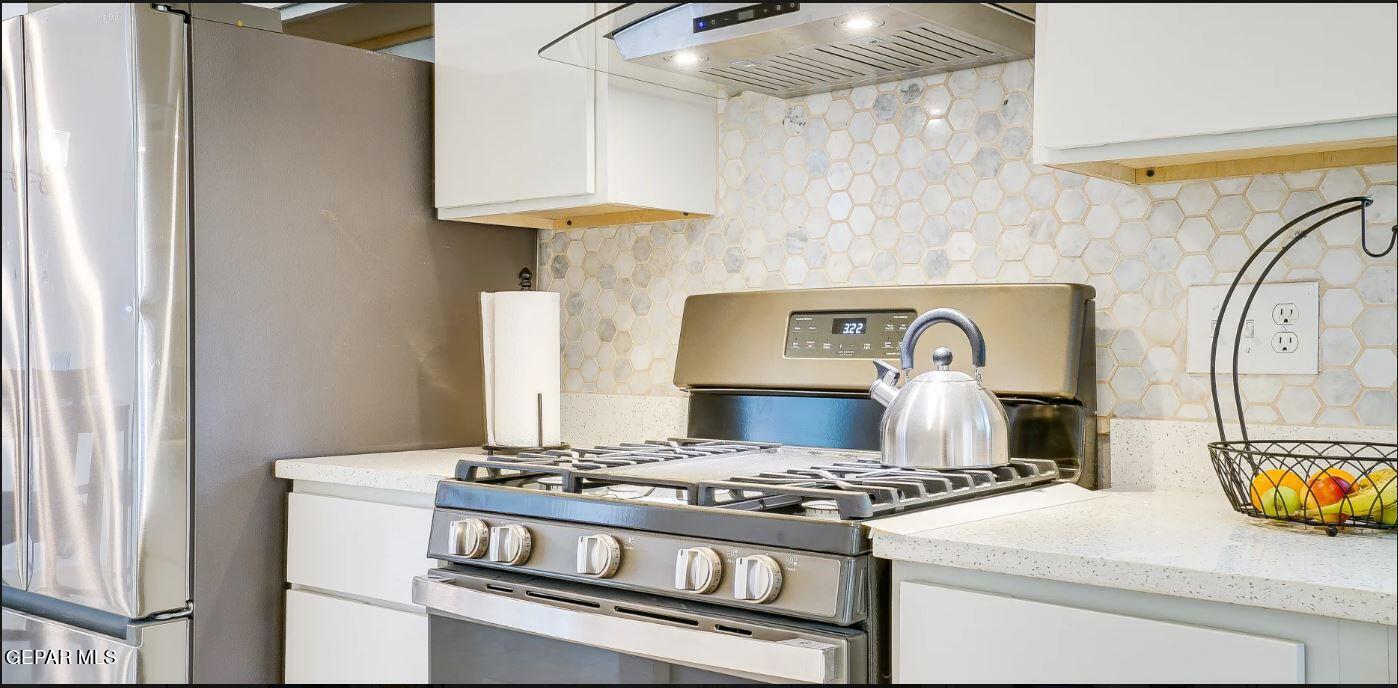 4012 Trowbridge Drive, Unit A FURNISHED El Paso, TX 79903 - Photo 18 of 53 a stove top oven sitting inside of a kitchen