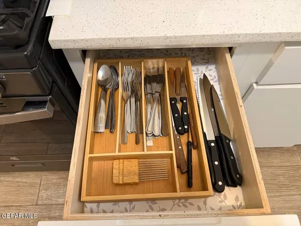 a view of living room with furniture and flat screen tv