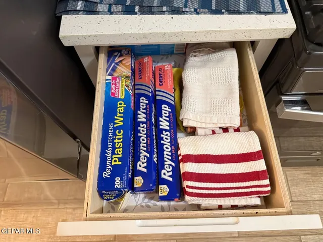 a bathroom with a sink vanity and toilet