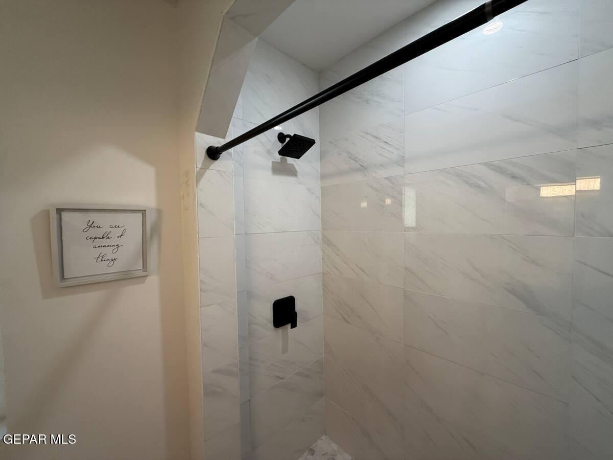 4012 Trowbridge Drive, Unit A FURNISHED El Paso, TX 79903 - Photo 35 of 53 a bathroom with a shower