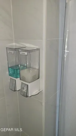 a view of a workspace room with furniture and wooden floor