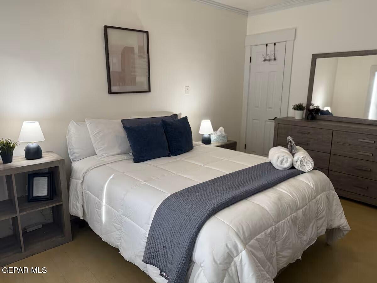 4012 Trowbridge Drive, Unit A FURNISHED El Paso, TX 79903 - Photo 40 of 53 a bedroom with a bed and night stand