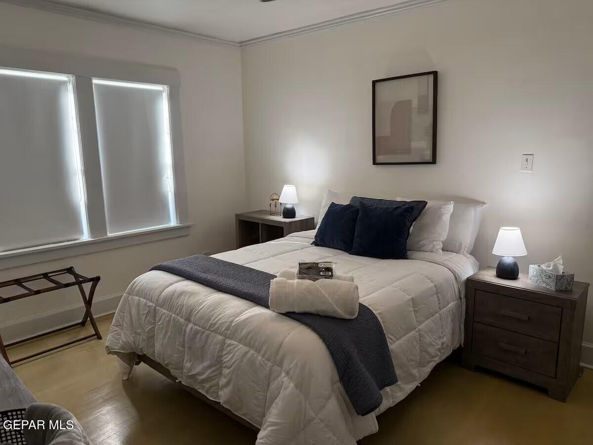 4012 Trowbridge Drive, Unit A FURNISHED El Paso, TX 79903 - Photo 41 of 53 a bedroom with a bed and window