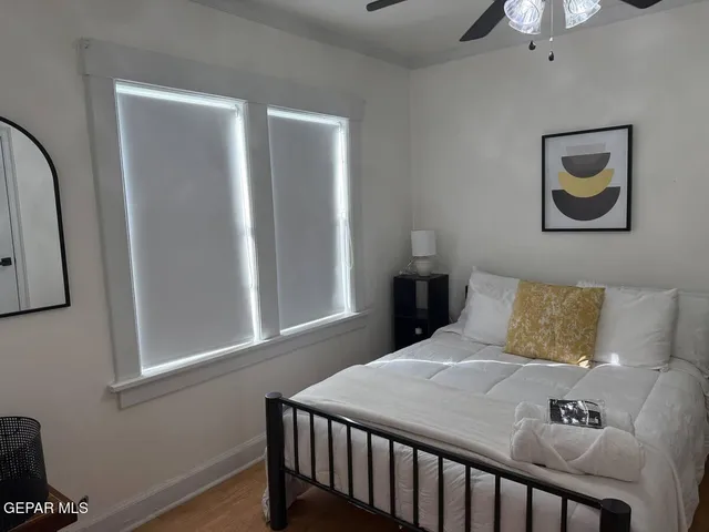 a view of a livingroom with furniture and window
