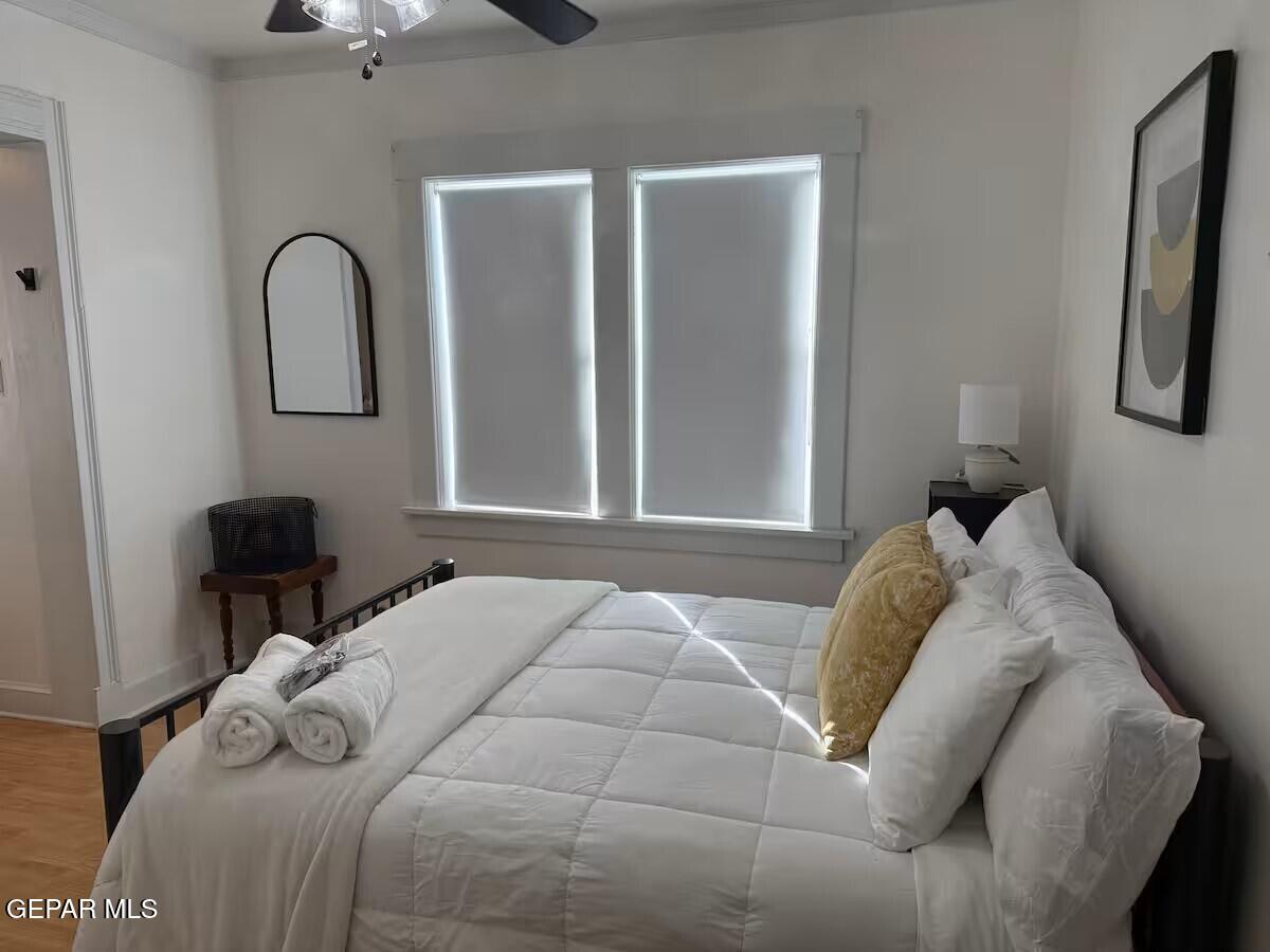 4012 Trowbridge Drive, Unit A FURNISHED El Paso, TX 79903 - Photo 45 of 53 a bedroom with a bed with window