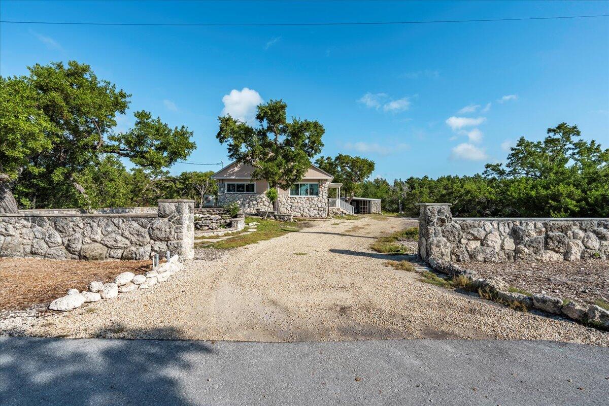 3167 Stewart Road Summerland Key, FL 33042 - Photo 8 of 33 a view of a yard with plants