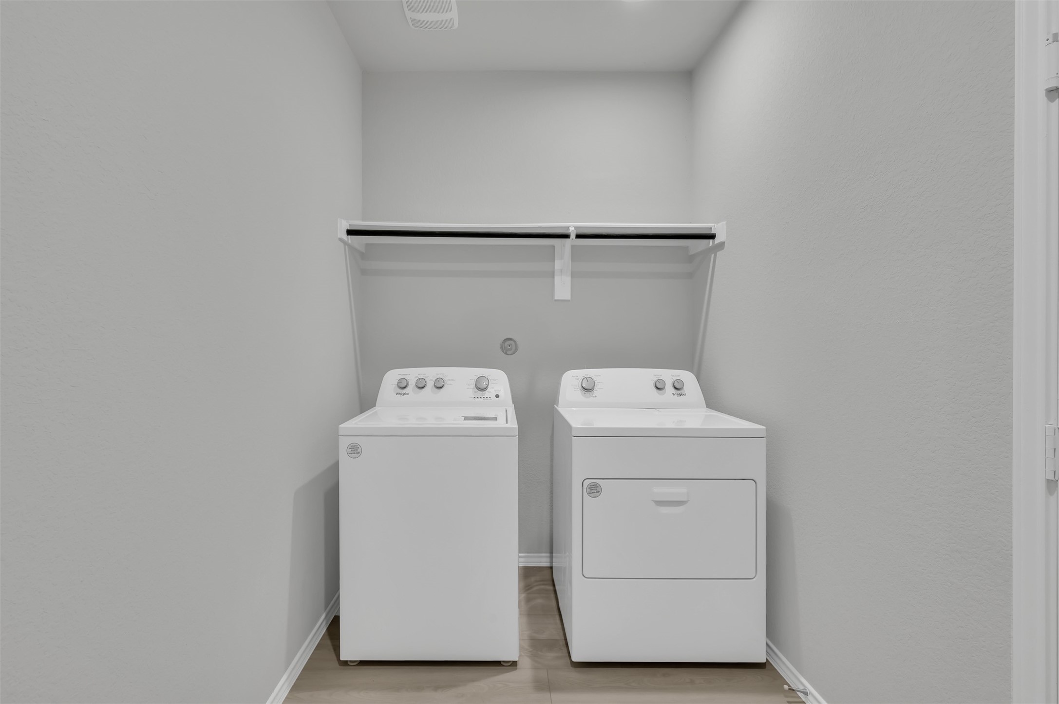 17105 Upland Bent Court Conroe, TX 77385 - Photo 16 of 40 a utility room with dryer and washer