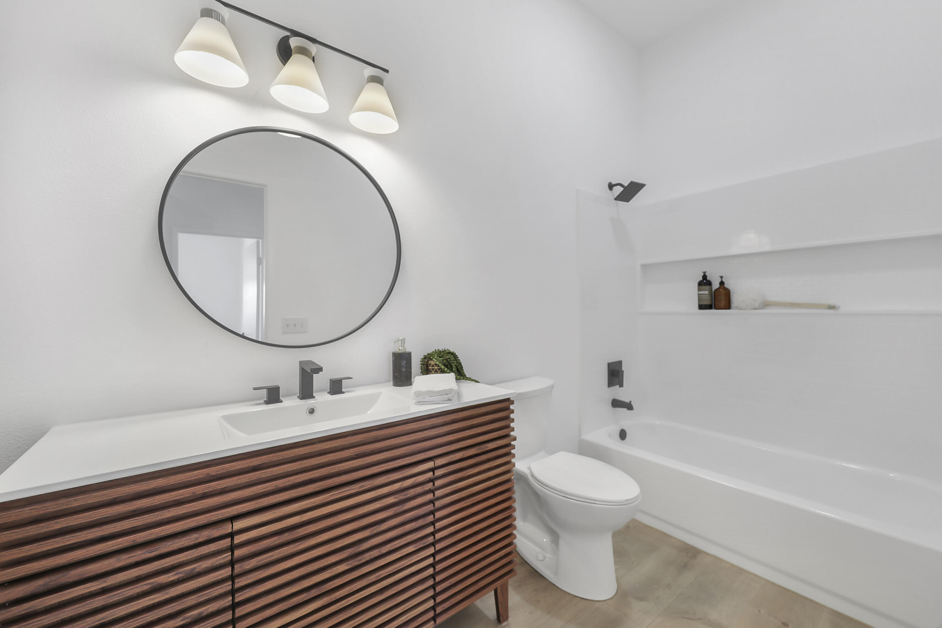 68256 Pasada Road Cathedral City, CA 92234 - Photo 16 of 35 a bathroom with a sink a toilet and a mirror