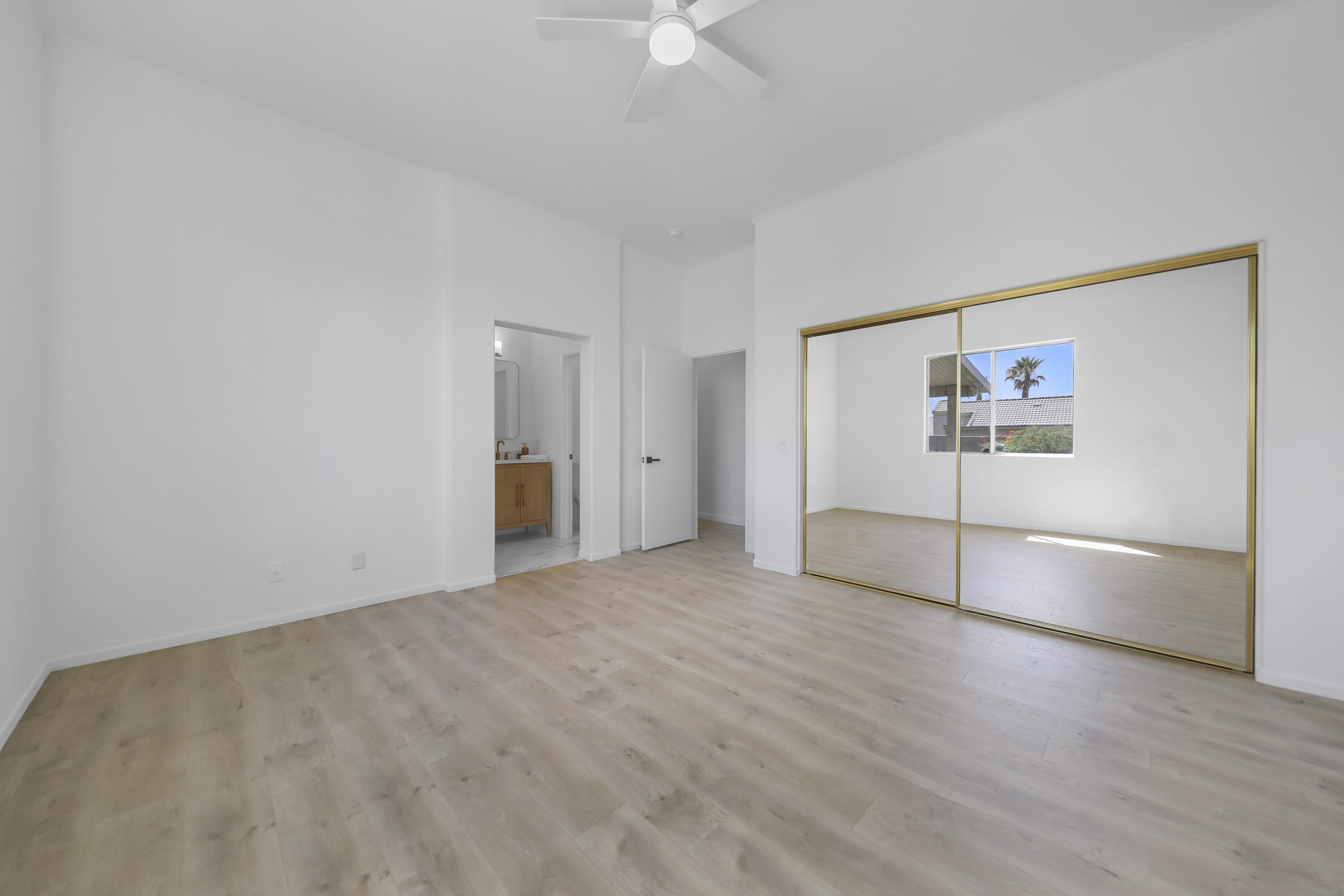 68256 Pasada Road Cathedral City, CA 92234 - Photo 18 of 35 a view of an empty room with a window