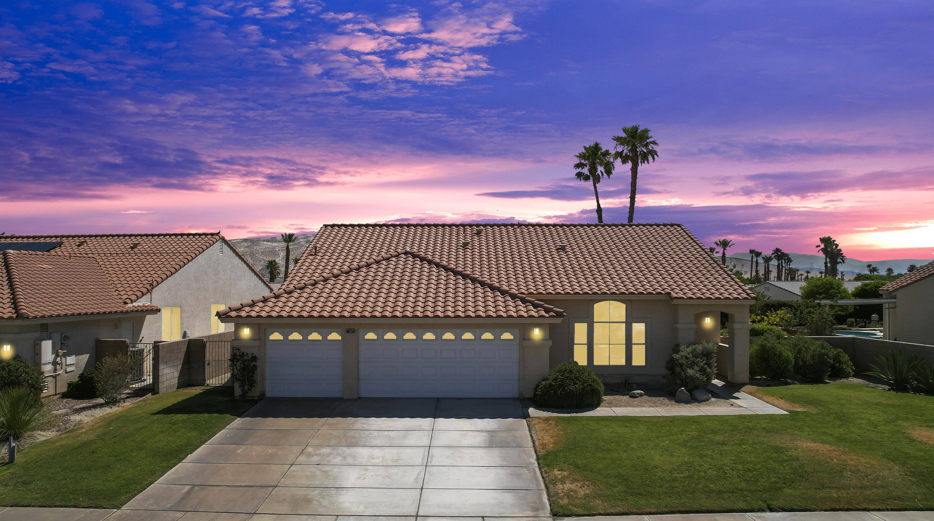 68256 Pasada Road Cathedral City, CA 92234 - Photo 2 of 35 a front view of a house with garden