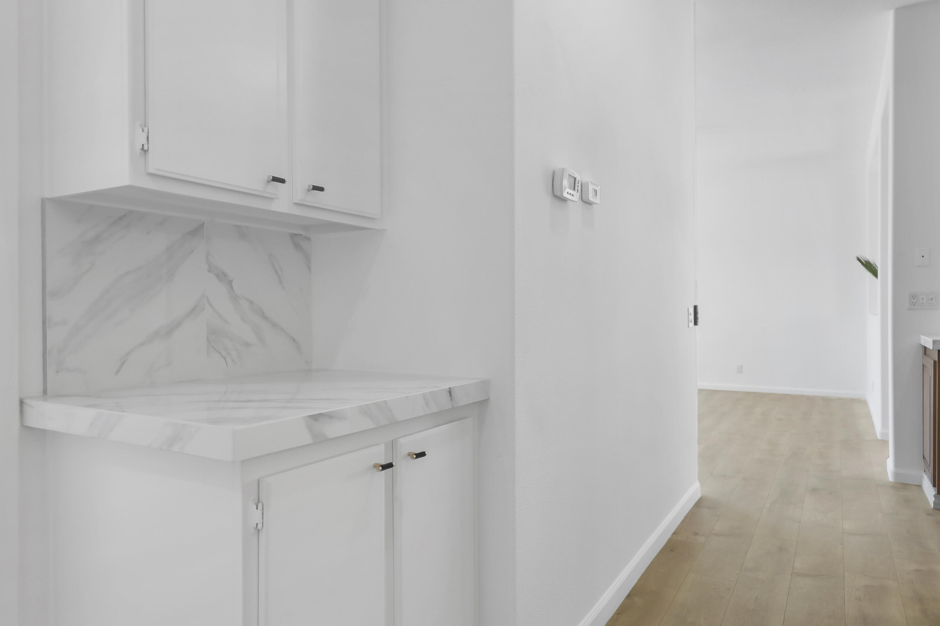 68256 Pasada Road Cathedral City, CA 92234 - Photo 21 of 35 a view of white cabinets