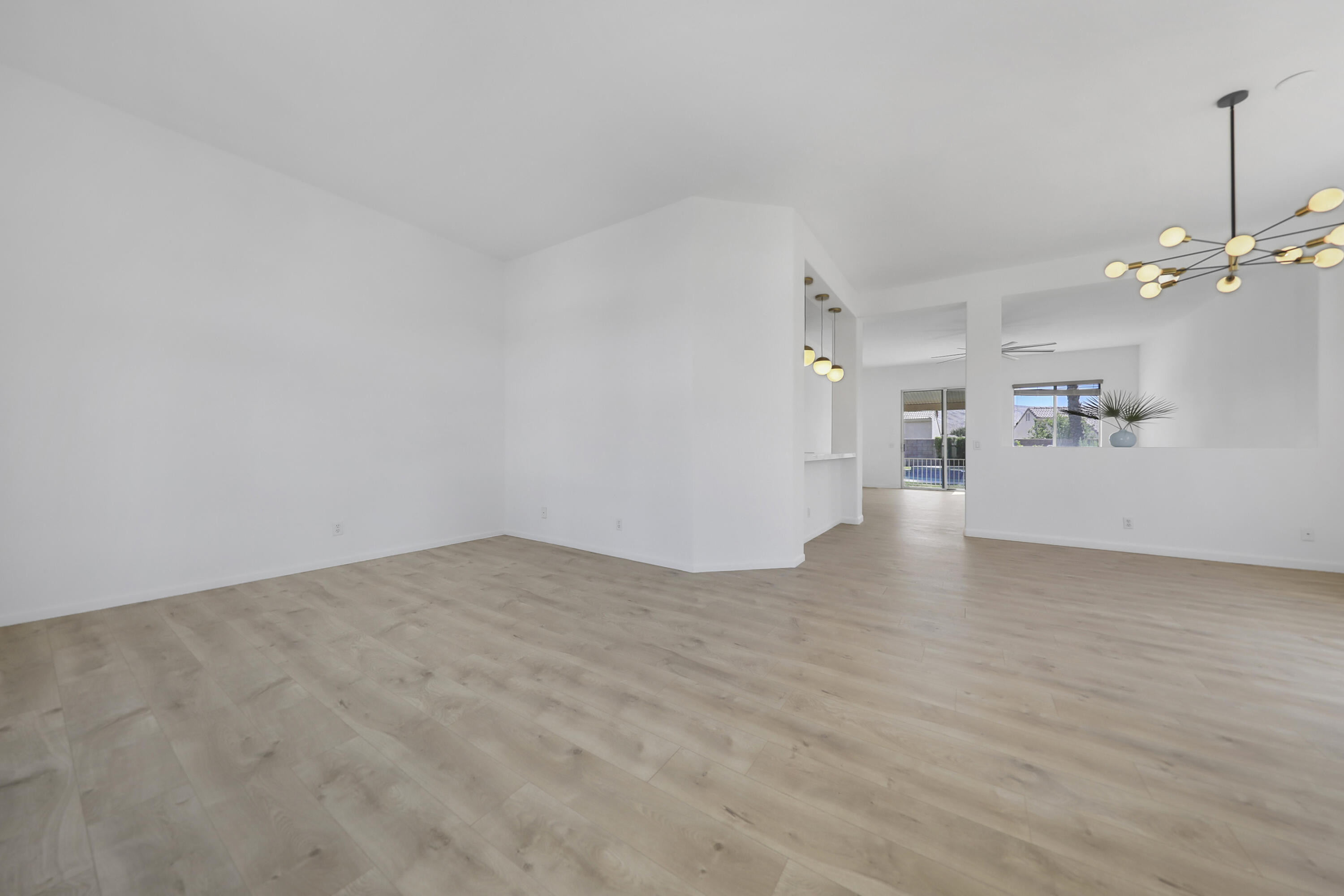 68256 Pasada Road Cathedral City, CA 92234 - Photo 6 of 35 a view of an empty room with a kitchen