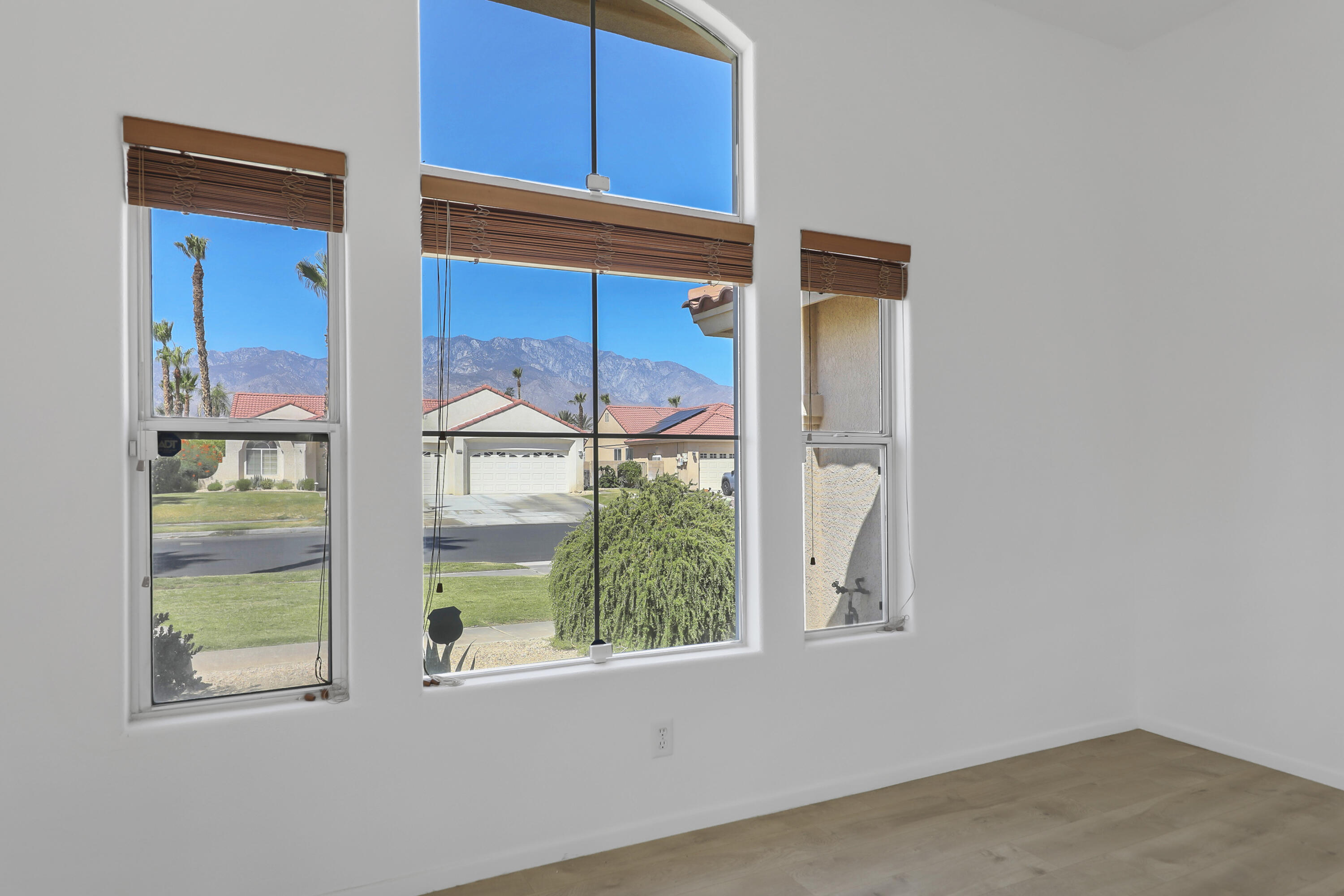 68256 Pasada Road Cathedral City, CA 92234 - Photo 8 of 35 a window with a small yard