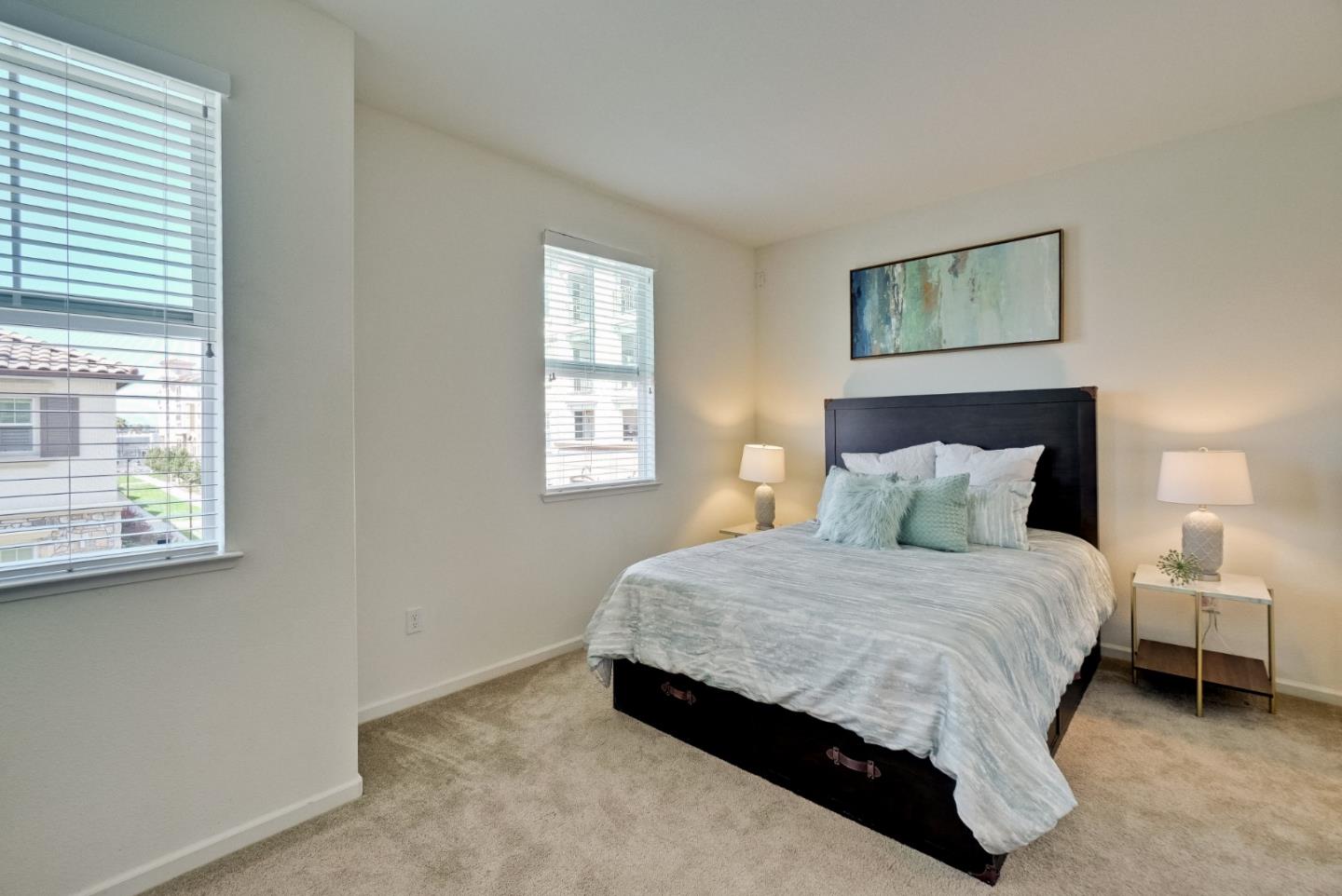 1305 Merry Loop Milpitas, CA 95035 - Photo 18 of 30 a bedroom with a bed and a window