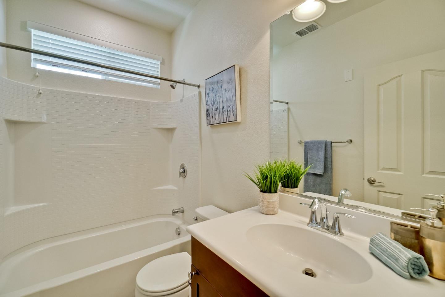 1305 Merry Loop Milpitas, CA 95035 - Photo 20 of 30 a bathroom with a sink toilet and shower