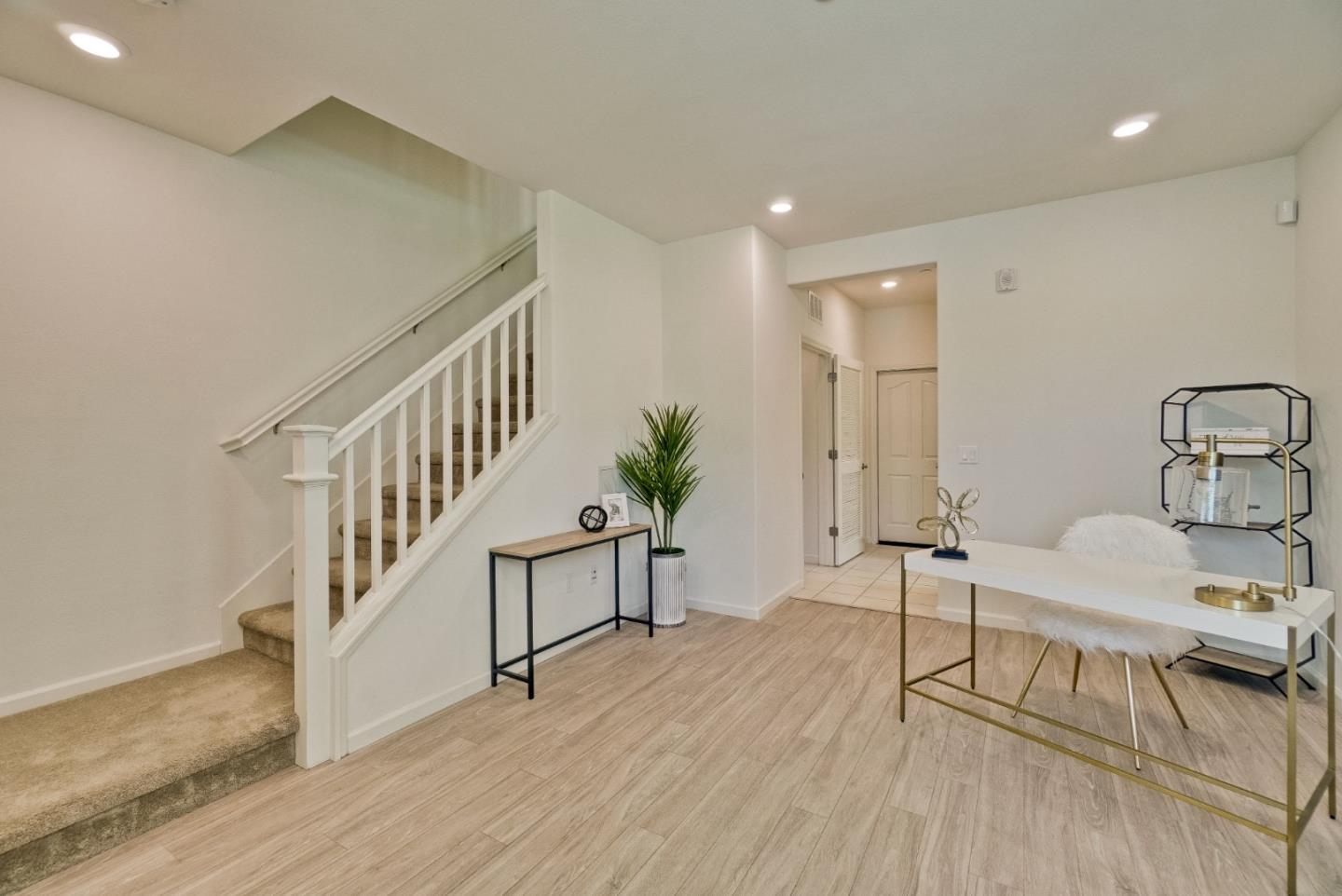 1305 Merry Loop Milpitas, CA 95035 - Photo 2 of 30 a living room with furniture and a wooden floor