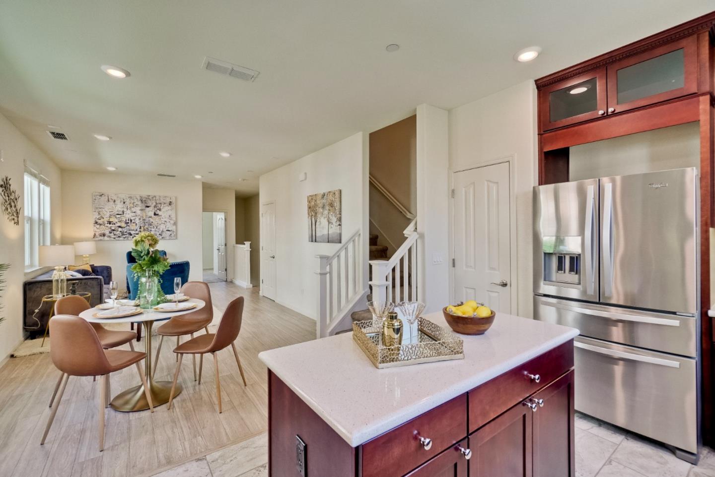 1305 Merry Loop Milpitas, CA 95035 - Photo 6 of 30 a kitchen with stainless steel appliances granite countertop a refrigerator and a sink