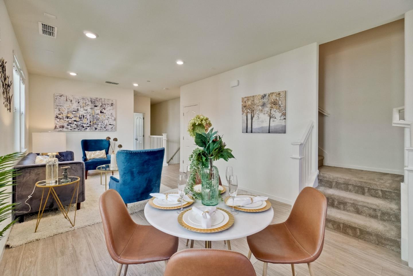 1305 Merry Loop Milpitas, CA 95035 - Photo 10 of 30 a view of a dining room with furniture a rug and wooden floor