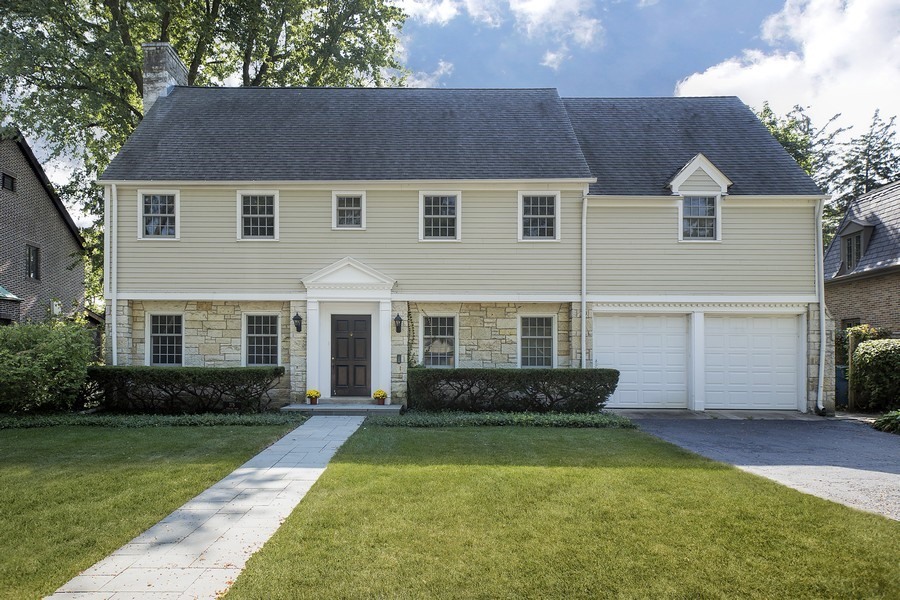 375 Sterling Road Kenilworth, IL 60043 - Photo 1 of 28 a front view of a house with a yard